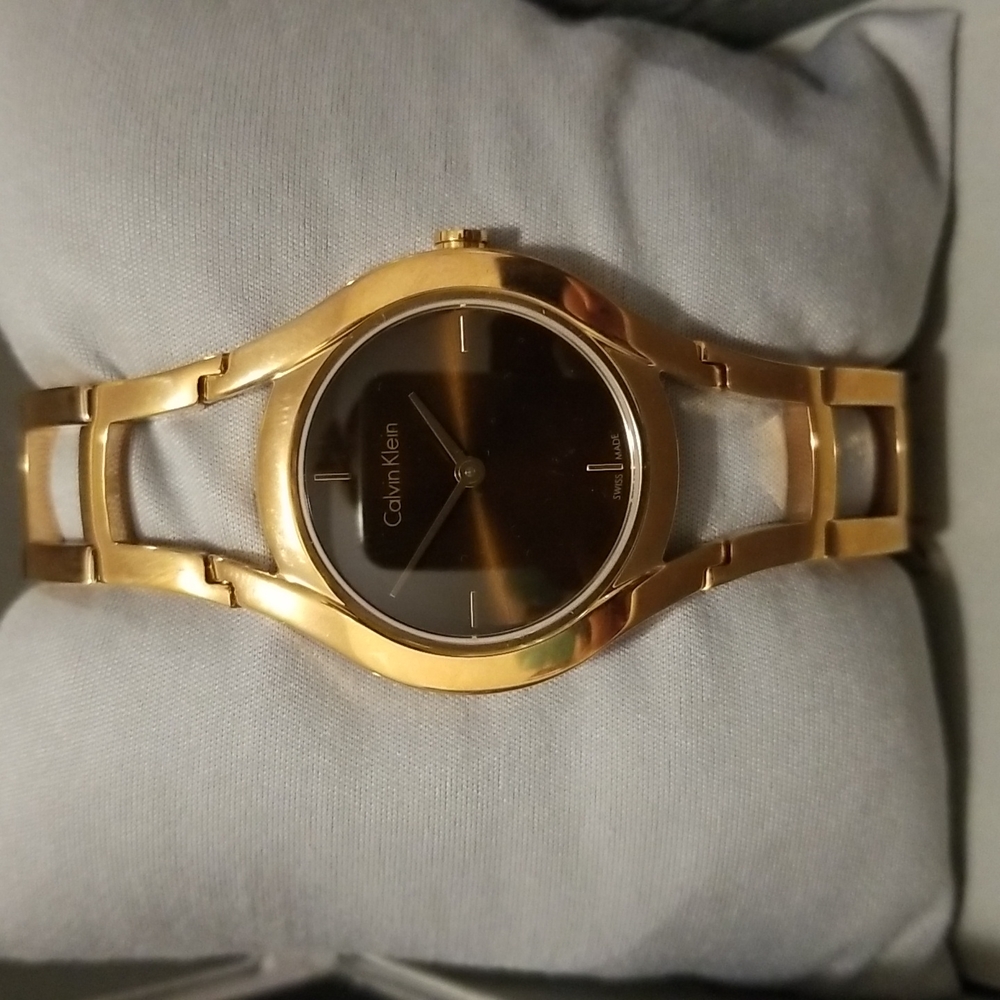 Calvin Klein women watch. In pink gold stainless Steel.  New with original box.